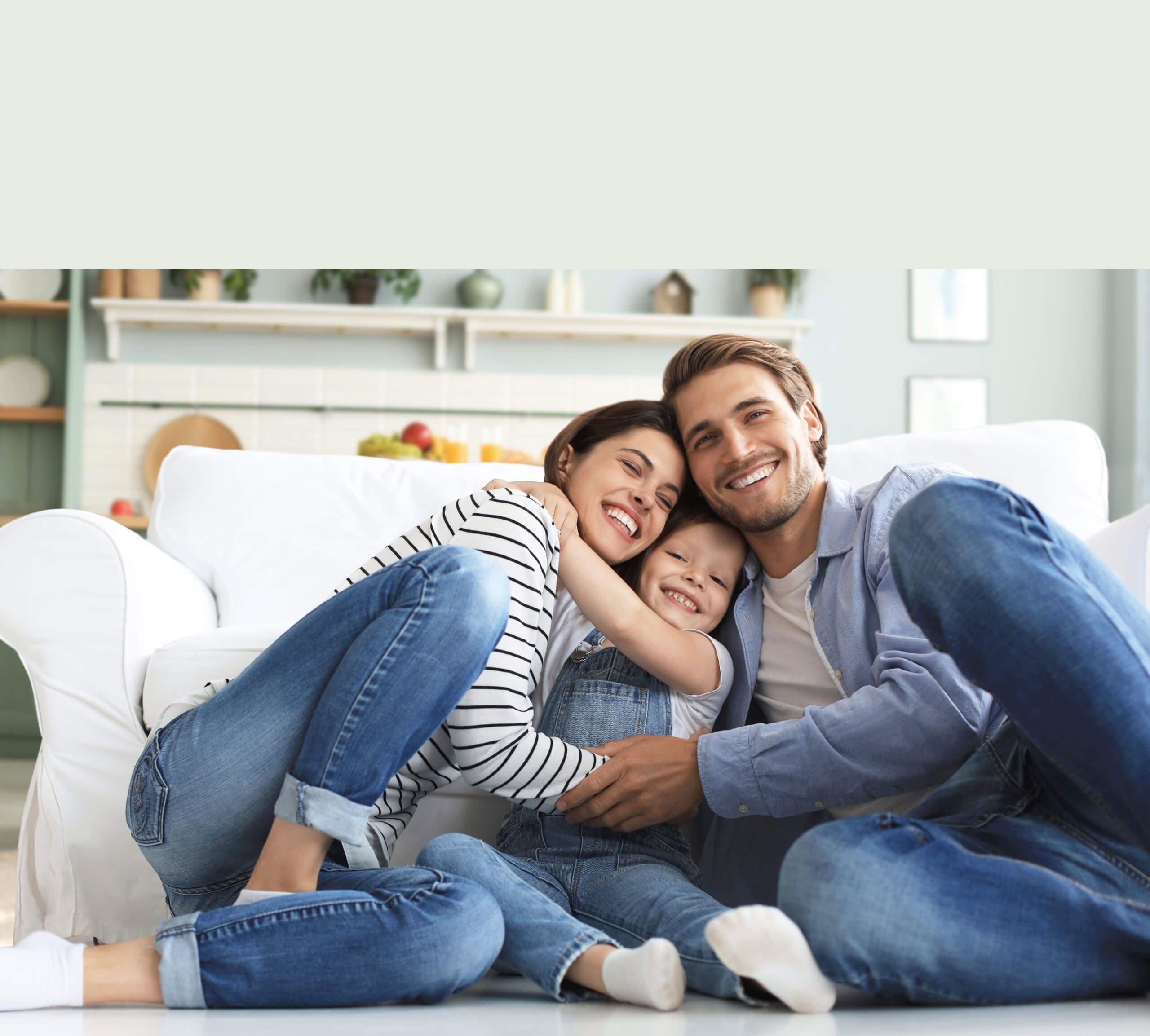 A happy family embracing together at home
