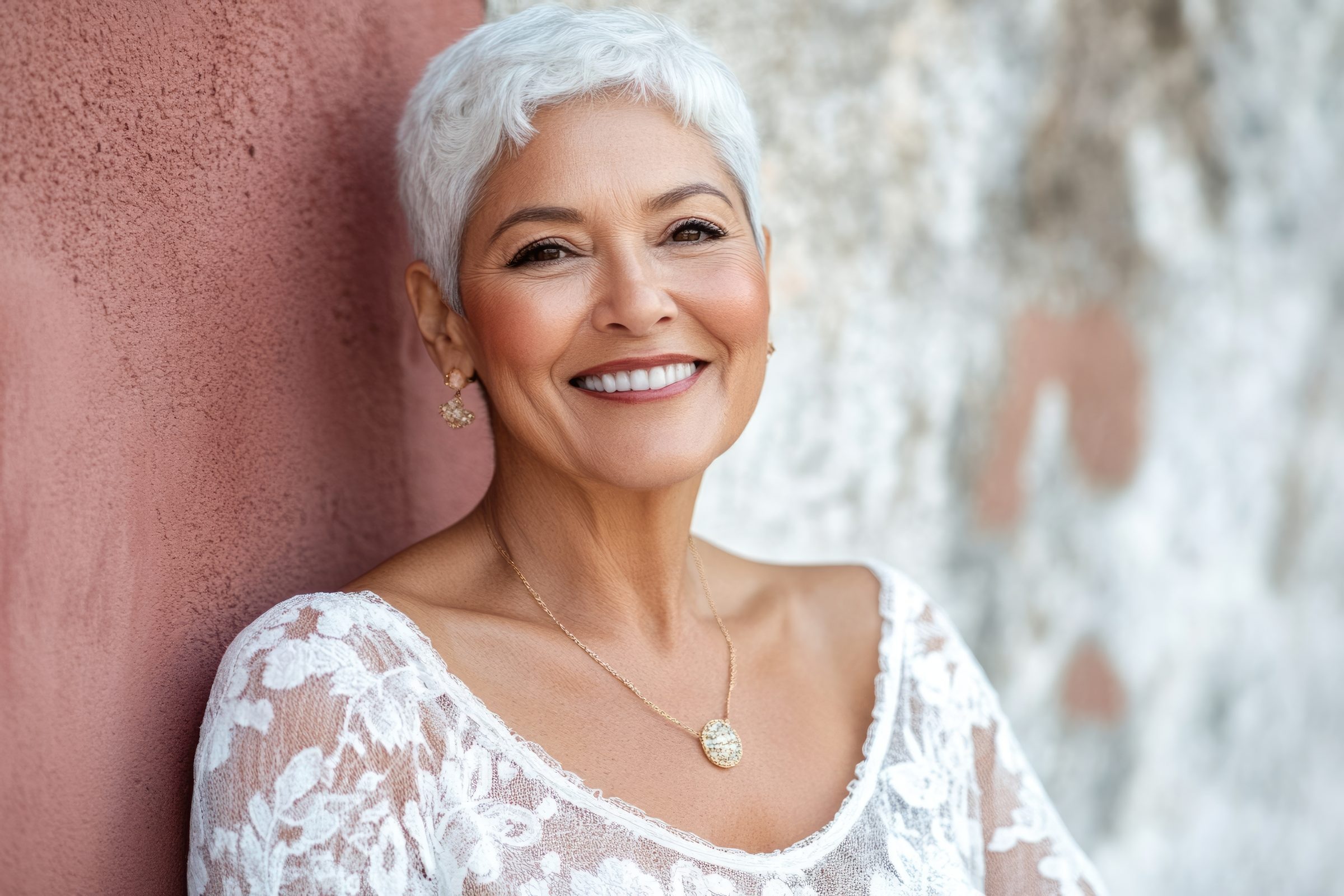 A smiling senior patient with a natural denture fit